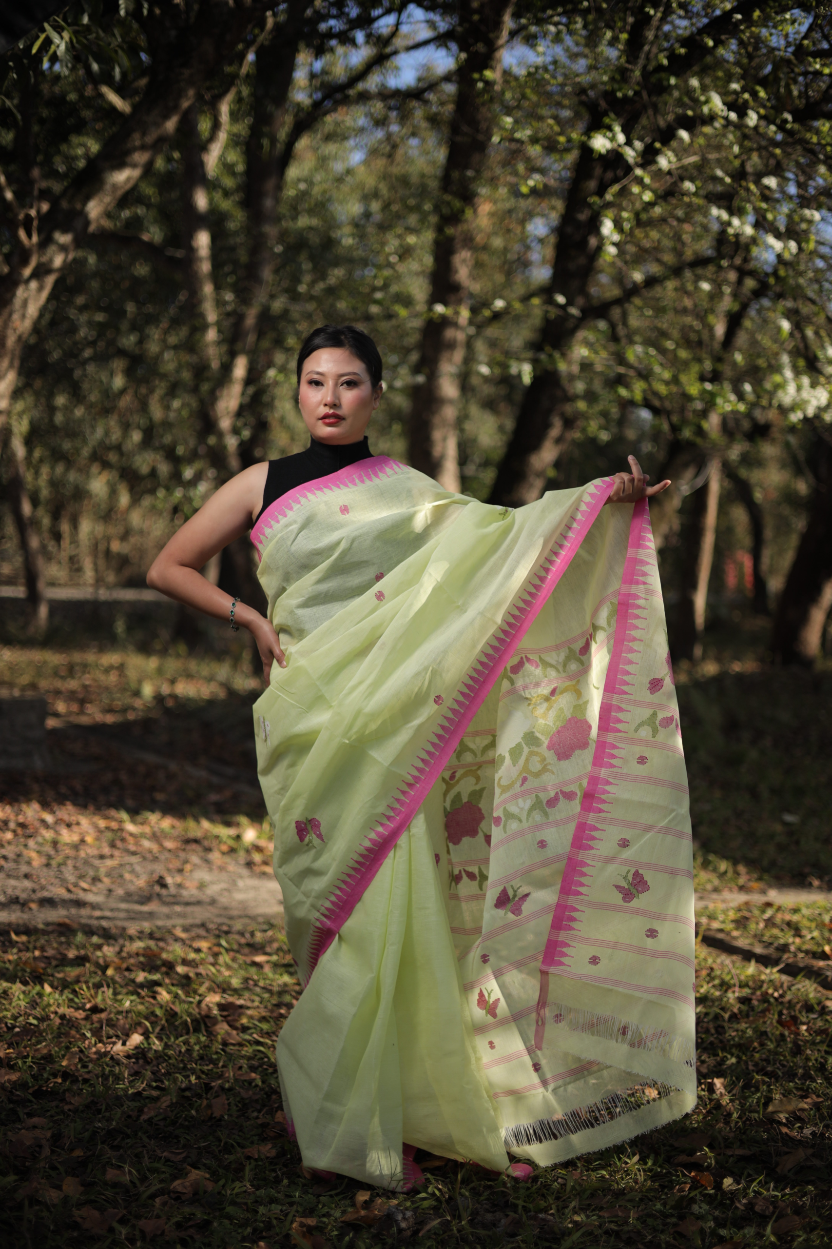 Graceful Light Yellow Wangkhei Cotton Saree with Pink Border