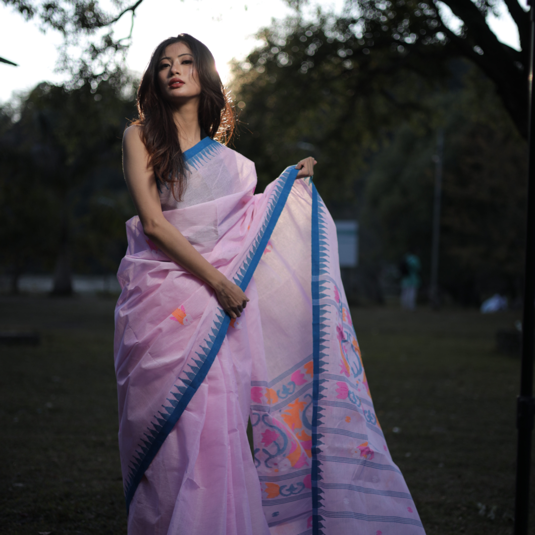 Graceful Pink Wangkhei Cotton Saree with Rich Blue Border