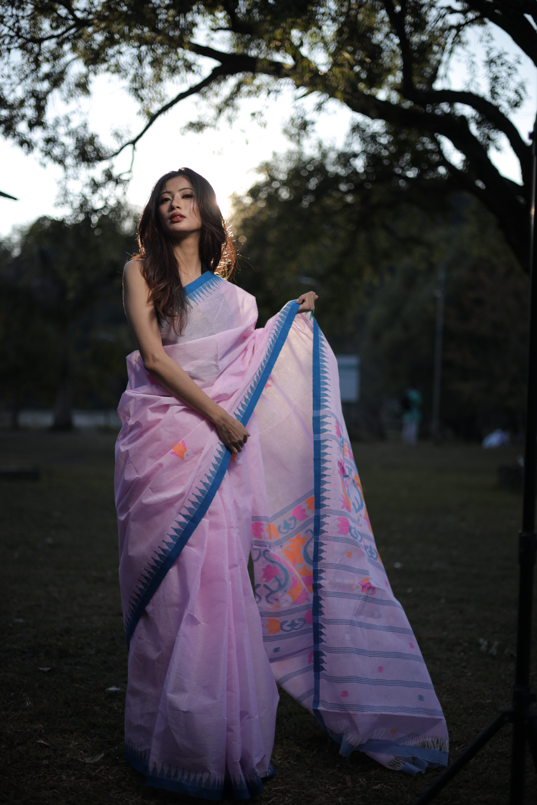 Graceful Pink Wangkhei Cotton Saree with Rich Blue Border