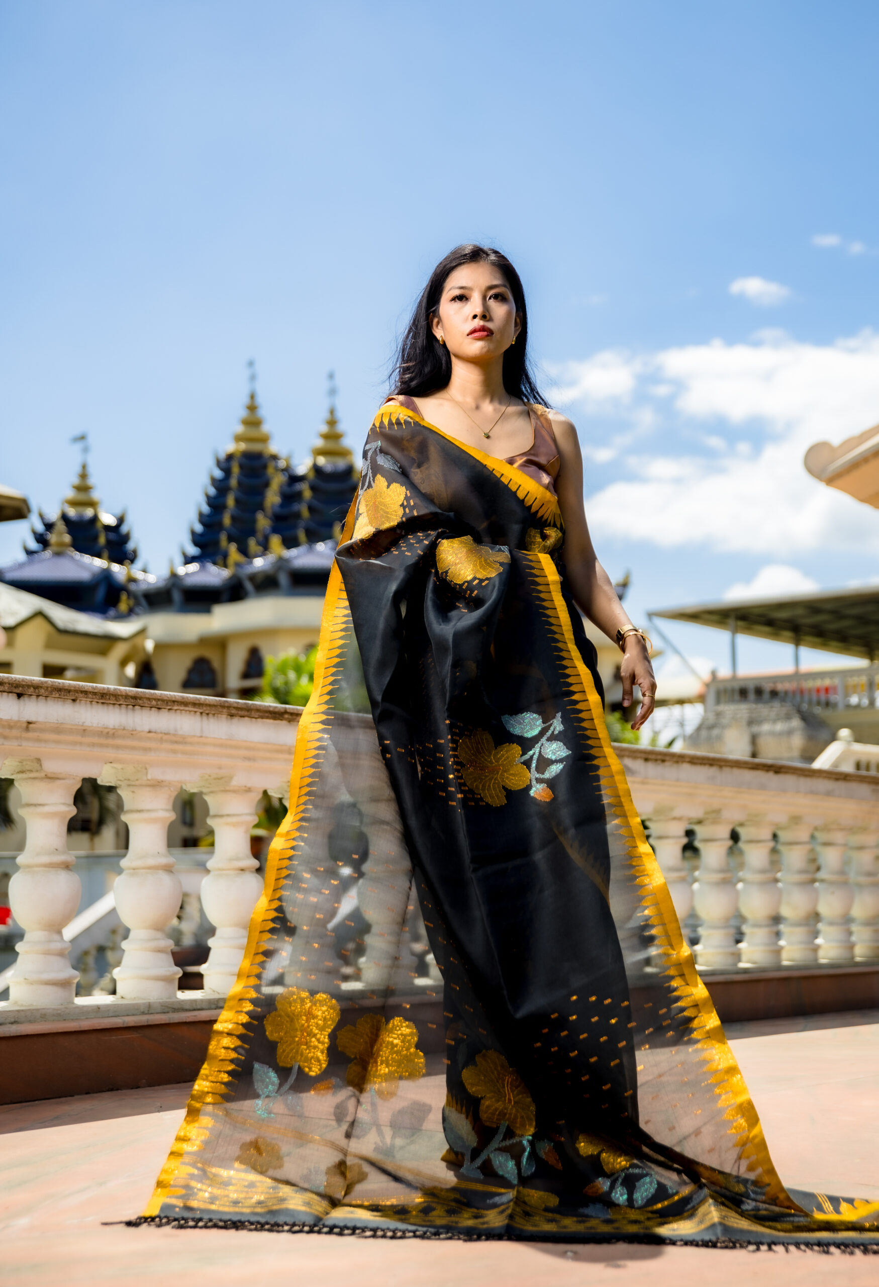 Charcoal Black Semi Raw Mulberry Silk Saree with Golden Moirangphee Border & Hibiscus Motifs