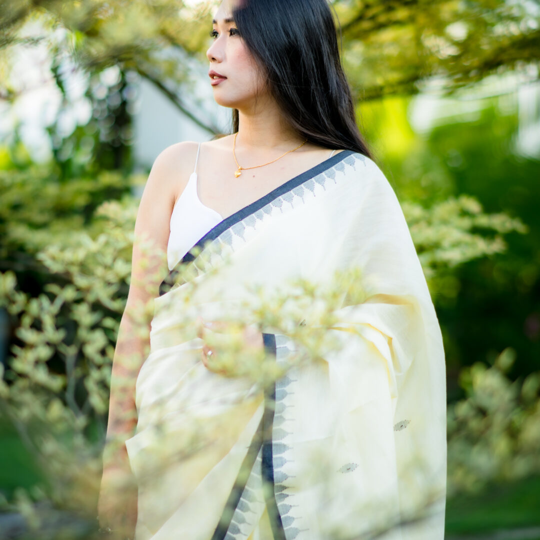 Elegant Off-White Moirangphee Cotton Saree with Black Handwoven Floral Pallu